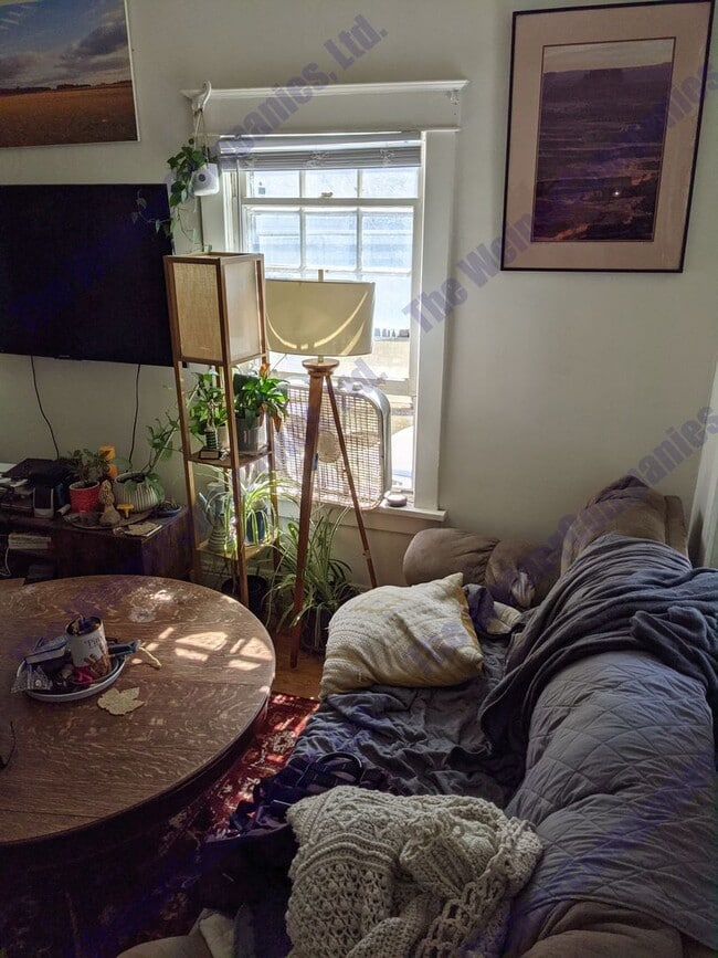 Photo - Charming 2-Bedroom House with Front Porch ...