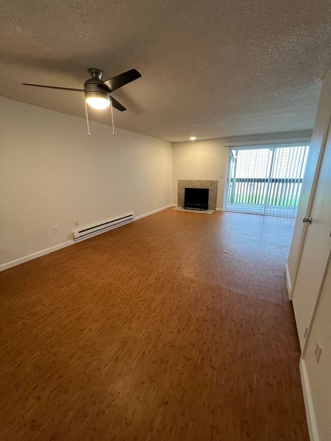 Photo - Updated 2-Bedroom Townhome Near Boeing & I-5 with Fireplace & Utilities Included Unit 2