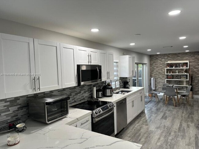 Building Photo - 9960 NW 51st Ln Rental