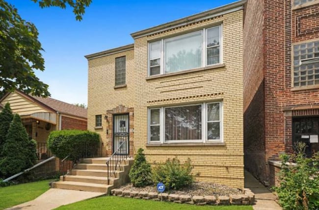 Building Photo - 10324 S Vernon Ave