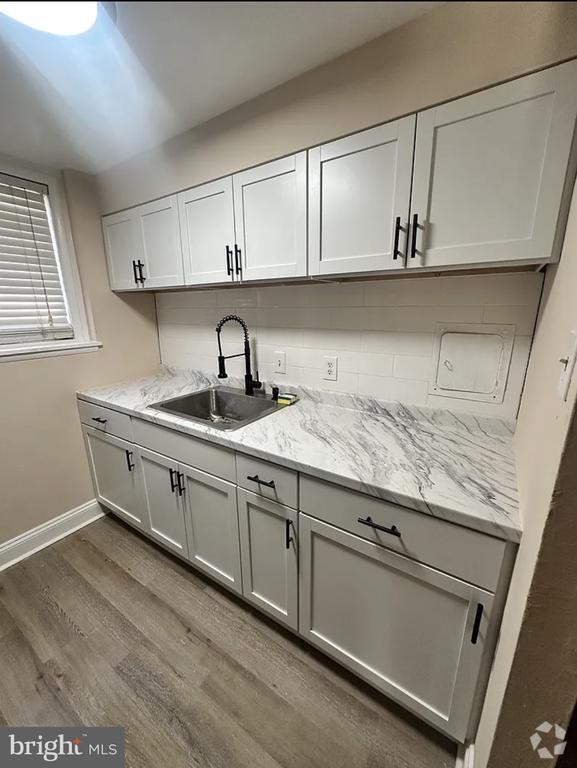 Building Photo - 7186 Donnell Pl Unit A-8 Rental
