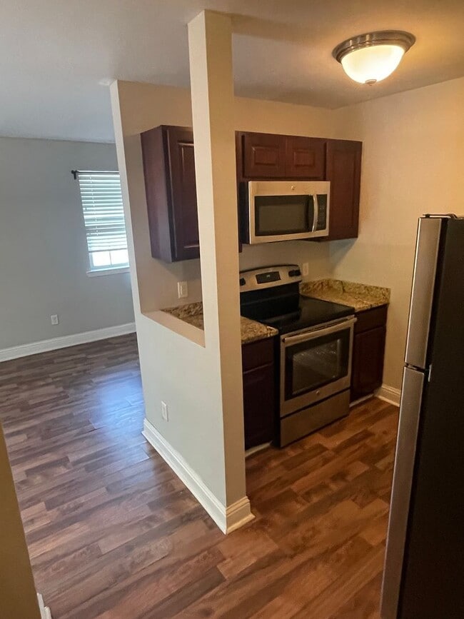 Photo - Renovated 1 bedroom with washer/dryer! Gated complex, centrally located. Unit 1802 Philip #103