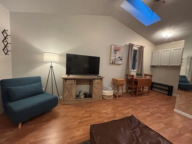 Living room/dining room with vaulted ceilings - 105 W Florida Ave Unit 105 W. Florida