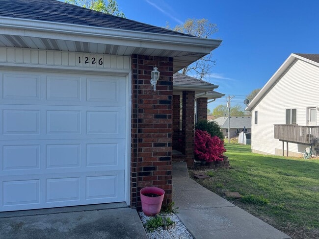 Photo - COMING SOON! All-Brick Duplex near Nixa High School