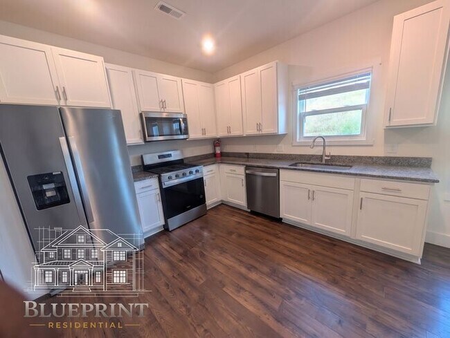 Photo - 2024 build, great neighborhood, stainless appliances, granite countertops!