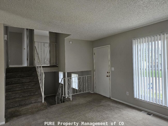 Photo - Tri-level home with central air and 1-car garage