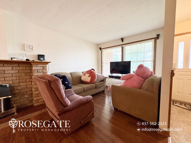 Photo - Spacious 2-Bedroom Main Level Apartment with Garage & Backyard – Welland Unit 1