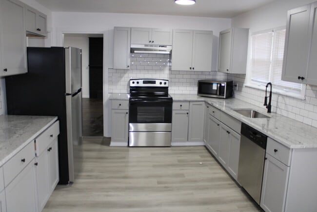 Photo - Move in Special - Spacious 4 Bedroom, 3 Fu...
