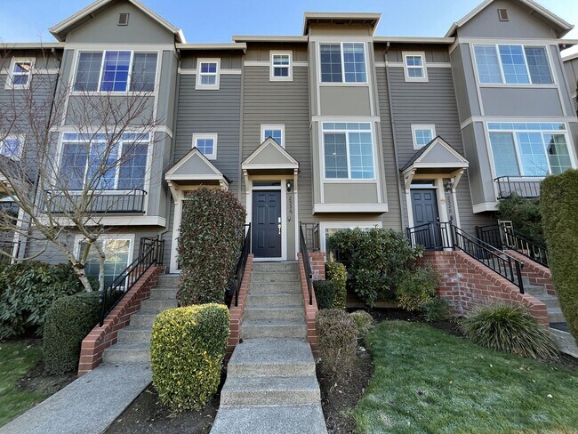 Photo - Bright 3-Level Townhome with Open-Concept Living, Built-In Fireplace & Included Wi-Fi
