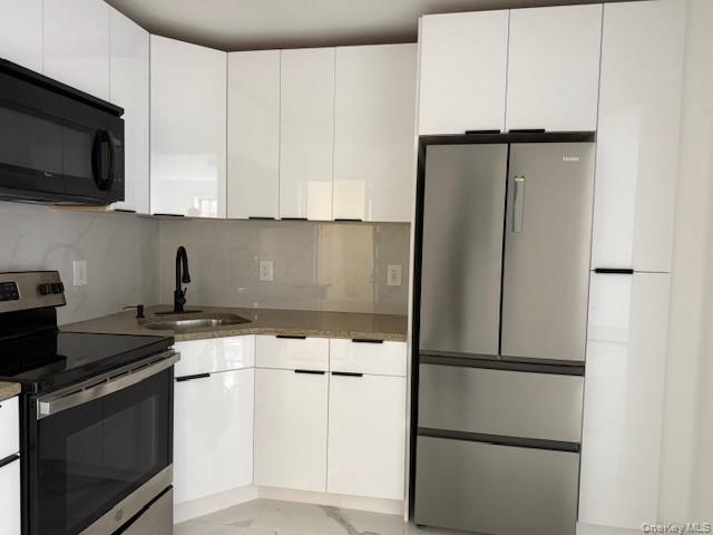 Photo - 58-24 Granger St Unit 2nd FL