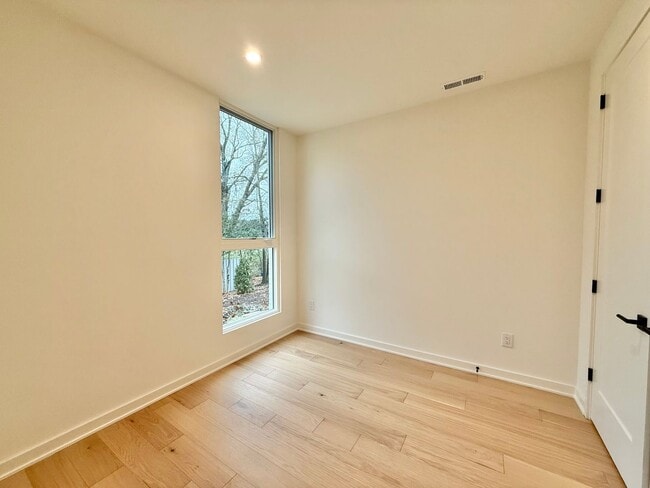 Photo - Luxurious New Construction 4BD, 2.5BA Raleigh Townhome with a Rooftop Terrace in a Prime Location...