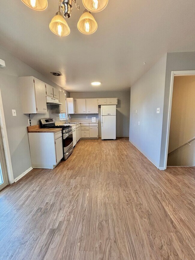 Photo - Expansive 5-Bedroom Home with Modern Comfort & Flexible Living Space! Available Now!!