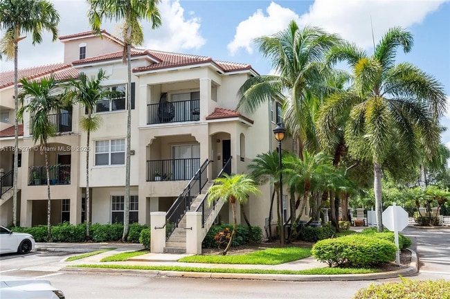 Photo - 5820 W Sample Rd Unidad Poinciana 2-105