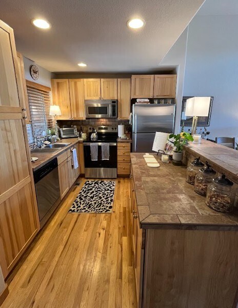 Stainless steel appliances - open concept