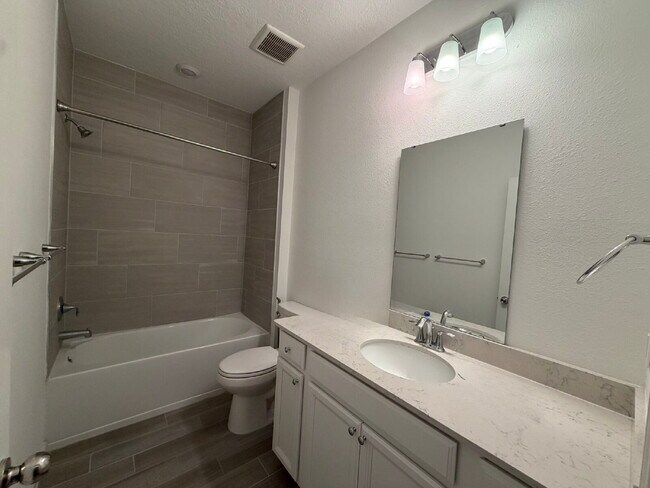 Photo - Highland Chase 3-Car Garage