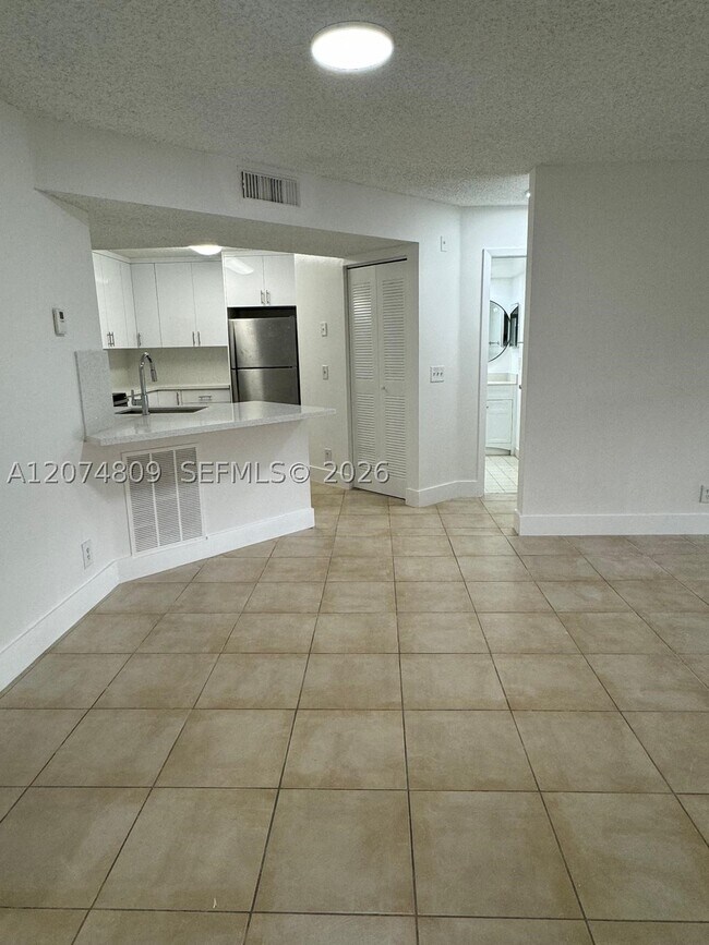 Photo - 8801 Wiles Rd Unit 103