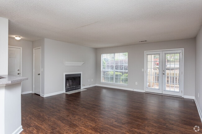 Living Room with Patio & Fireplace- 1st Floor
