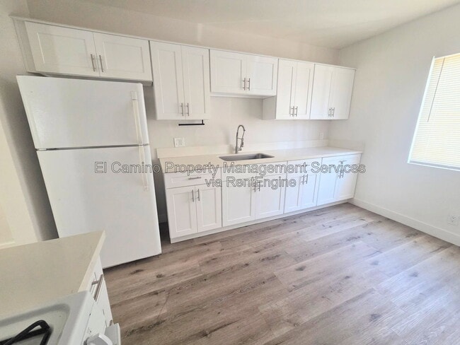 Building Photo - 7722 Walker Ave Unit B