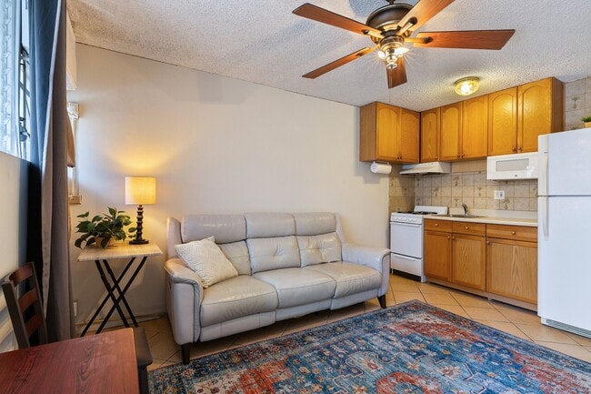 Building Photo - Furnished 1 Bed 1 Bath Condo. Includes Electric, Water, Sewer & Gas. Ample unassigned parking. Unit 205