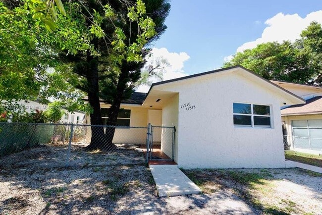 Building Photo - 11316 Peachtree Dr Unit 1