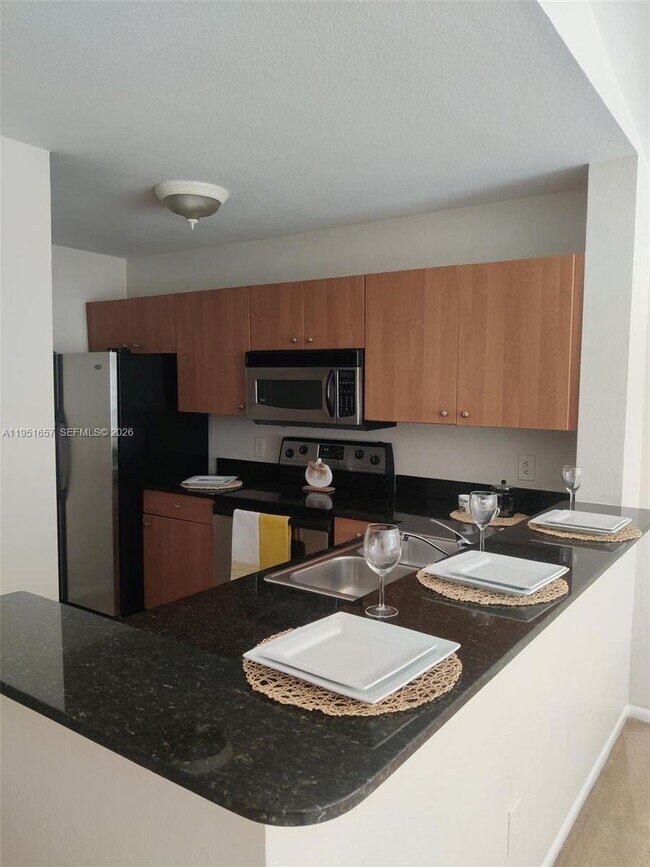 Photo - 1865 Palm Cove Blvd Unit 9-305