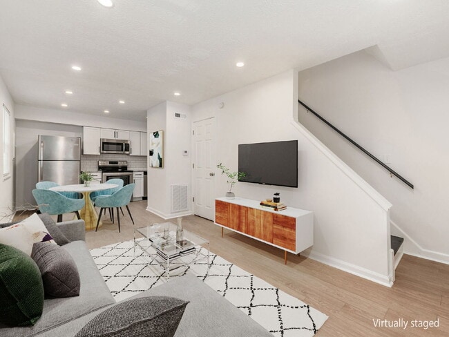 Building Photo - Half Month FREE — Updated 2BR w/ In-Unit Laundry, Central A/C + 2 Parking Spots | Touring starts ... Unit I
