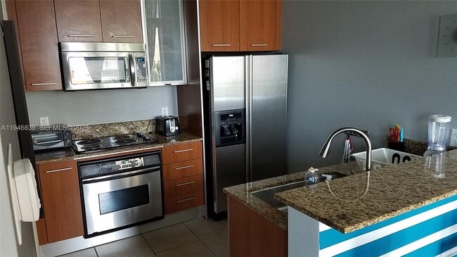 Building Photo - 9055 SW 73rd Ct Unit 702