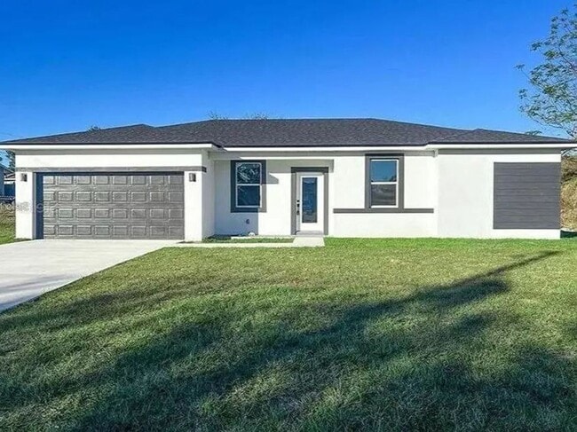 Building Photo - AMAZING new home has all the extras you ha...