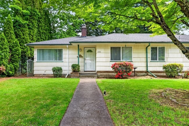 Photo - Charming Ranch Home with Hardwood Floors, Fireplace & Lush Curb Appeal