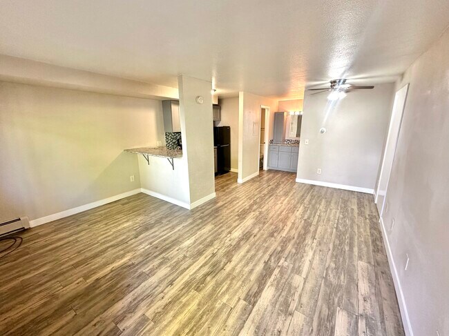 Experience the elegance of this modern apartment with an open, inviting layout. - Apex 980