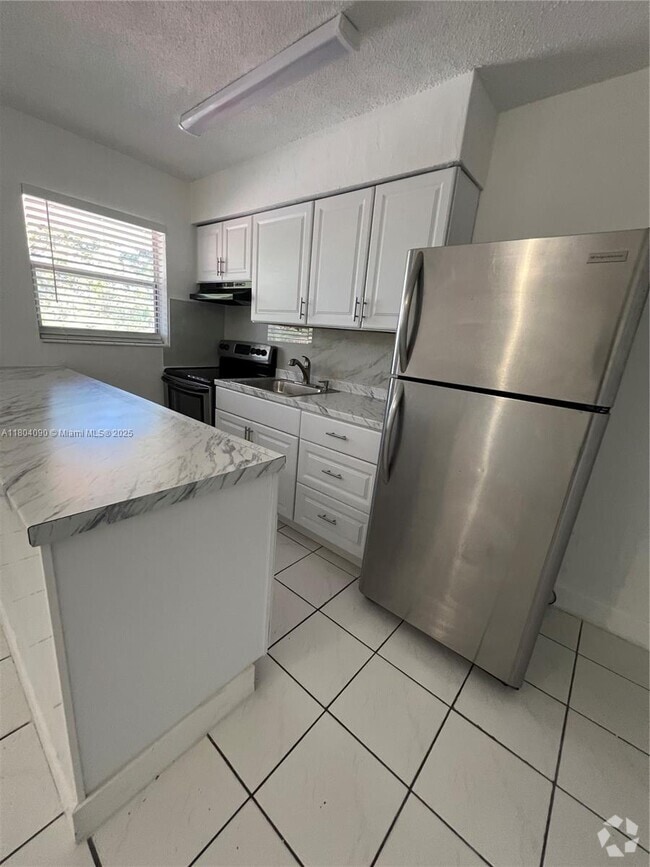 Building Photo - 7155 W 14th Ct Unit 19 Rental
