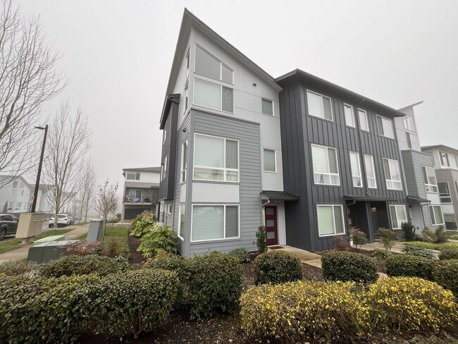 Photo - Three-Level Townhome with Island Kitchen, Bonus Room, Balcony & Attached Garage