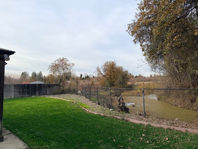 Photo - Beautiful updated 4/2 with 3 car garage close to Costco and south Redding Amenities! Dog friendl...