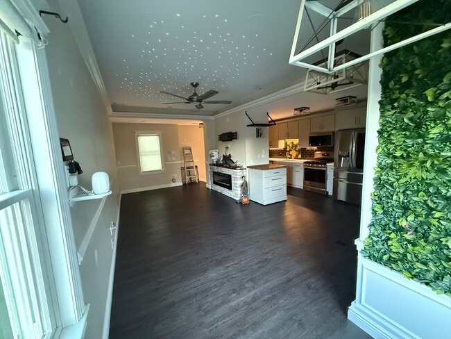 Living Room with Fire Place Heater - 99 Roland St Unit C