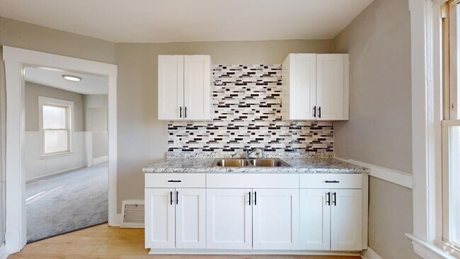 Building Photo - 3609 W.47th Unit Down Rental