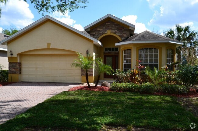 Building Photo - Fantastic 4 BR Lakefront Pool home zoned f...