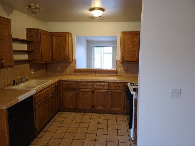 Photo - "Charming 2-Bedroom Oasis with Cozy Fireplace on Caracas Dr!"