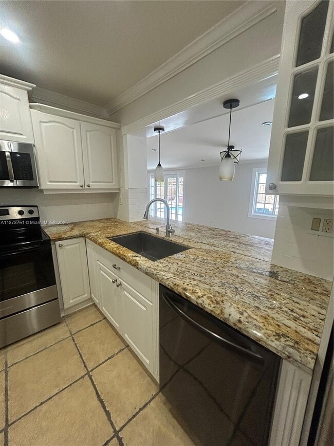 Building Photo - 1320 SW 102nd Ct Rental