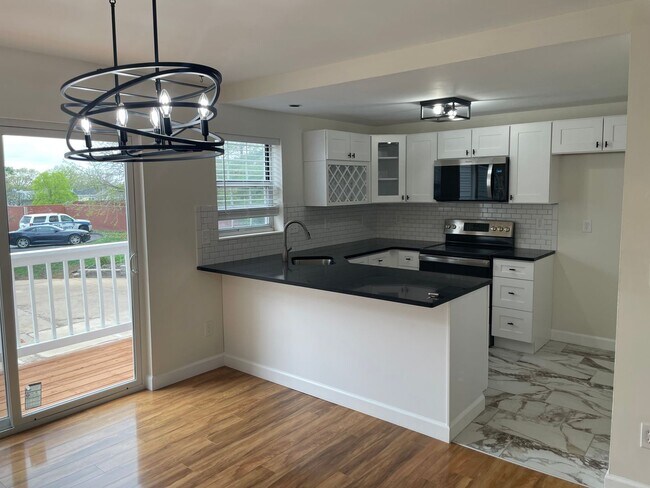 Photo - Beautiful 2 Bed, 1.5 Bath Townhome on the Edge of the Desirable Hill Neighborhood Available for Rent