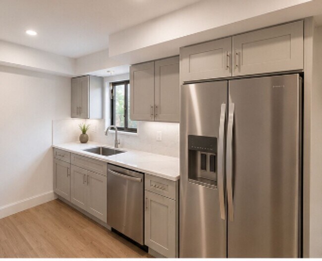 Photo - Modern Pet-Friendly 2BR in Washington Square with Parking, Balcony & In-Unit Laundry Unidad 201