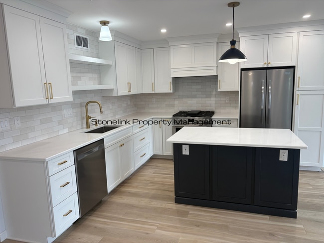 Photo - Fully Redesigned Townhouse Style Condo For Rent in Desirable Louisquisset Community!