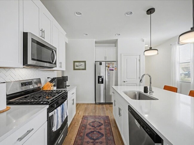 Photo - Spacious 4-Bedroom Home with Modern Features & EV Charging!