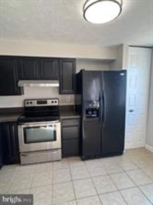 Photo - WELL MAINTAINED END UNIT TOWNHOUSE IN FARMBROOK