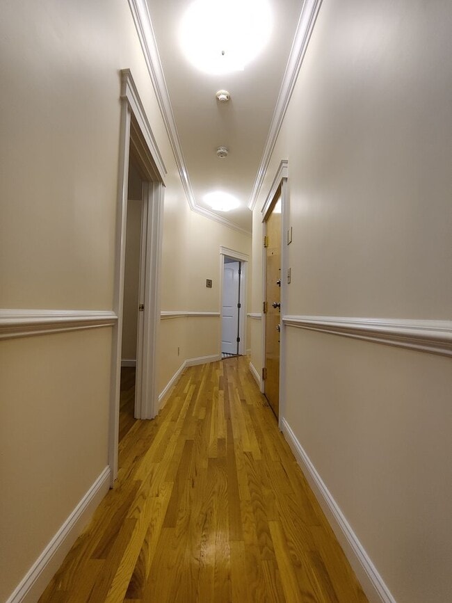 Photo - No Brokers Fee, No Security Deposit, Steps from the T Stop, Heat, Hot Water Included, Laundry is ...