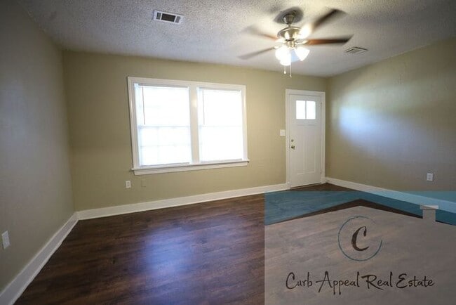 Photo - Recently renovated 3 bed, 1.5 bath home - back deck, garage, fenced yard!!