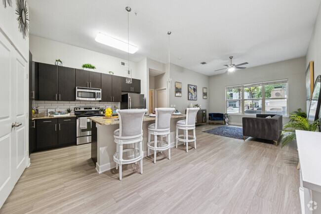 Modern Kitchen and Dining Room at Addison Keller Springs Apartments in Addison, TX - Addison Keller Springs Rental