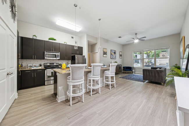 Modern Kitchen and Dining Room at Addison Keller Springs Apartments in Addison, TX - Addison Keller Springs Apartments