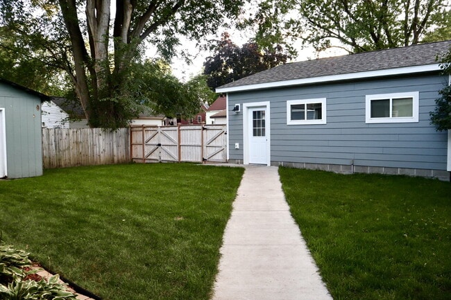 Photo - "Charming 4-Bed Oasis on Dakota Avenue: Spacious Living with 2 Full Baths in St. Louis Park!"