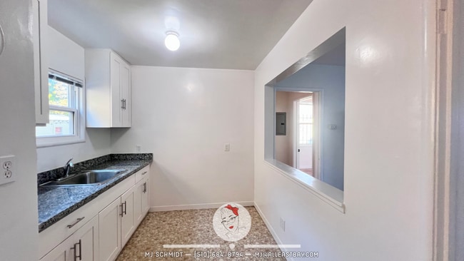 Photo - Remodeled 1 bedroom with hardwood flooring and spacious modern kitchen with new appliances! Unit A