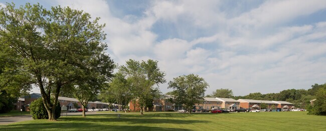 Photo - 2nd Floor: Discover private, elevated views and quiet surroundings in this sunny 1-bedroom apartm... Unidad R-12